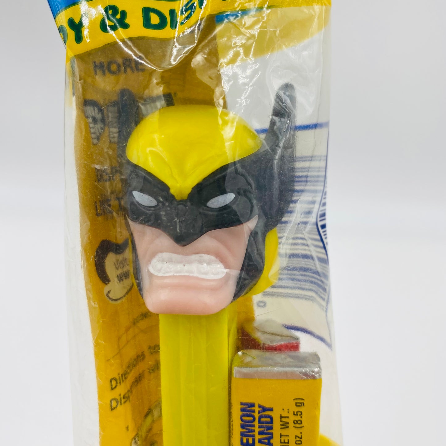 Marvel Wolverine (yellow stem) PEZ dispenser (1999) bagged 5.9 Slovenia blue cello