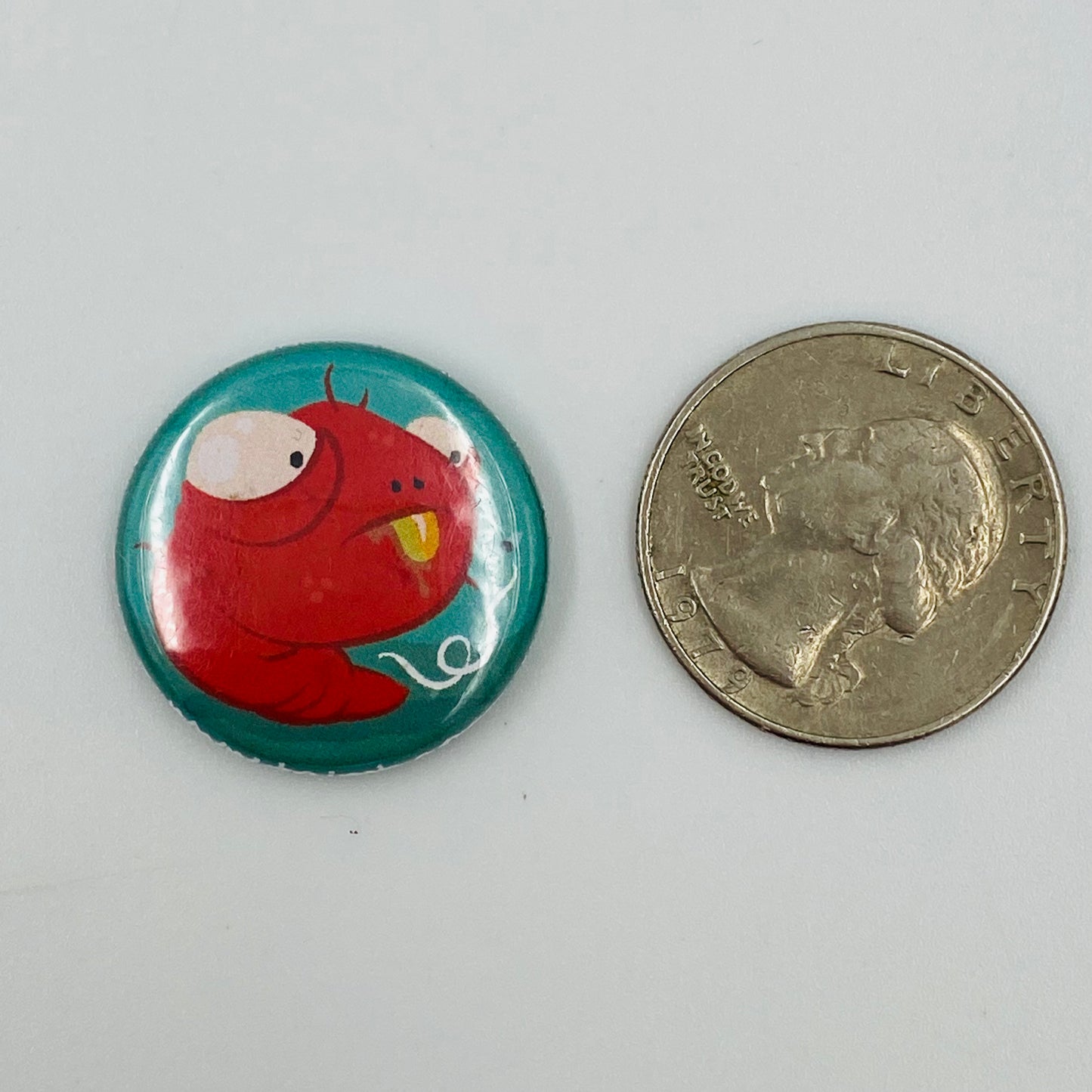 Andrew Bell The Creatures in my Head red worm pinback button