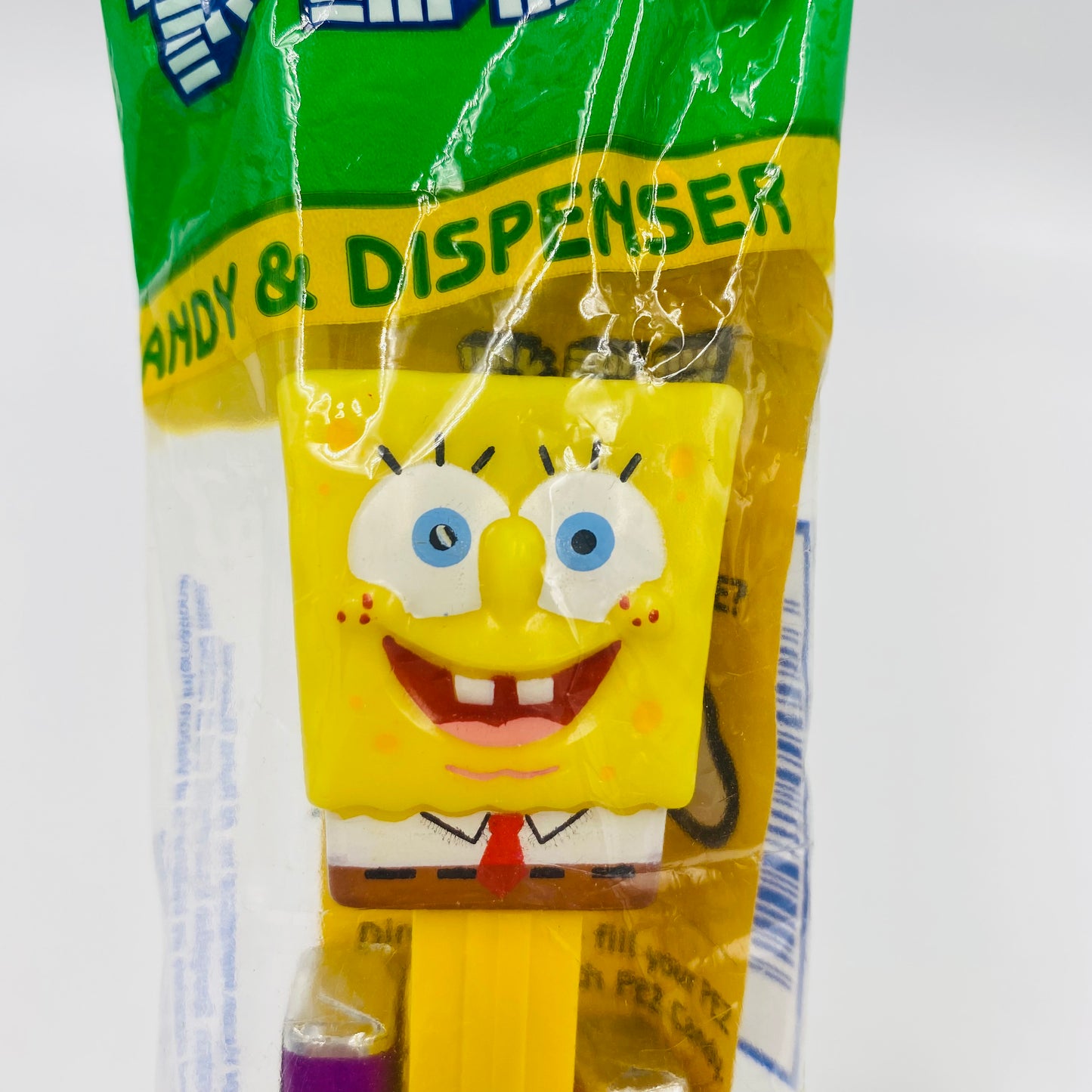 SpongeBob SquarePants yellow stem PEZ dispenser (2004) bagged 4.9 Hungary green cello