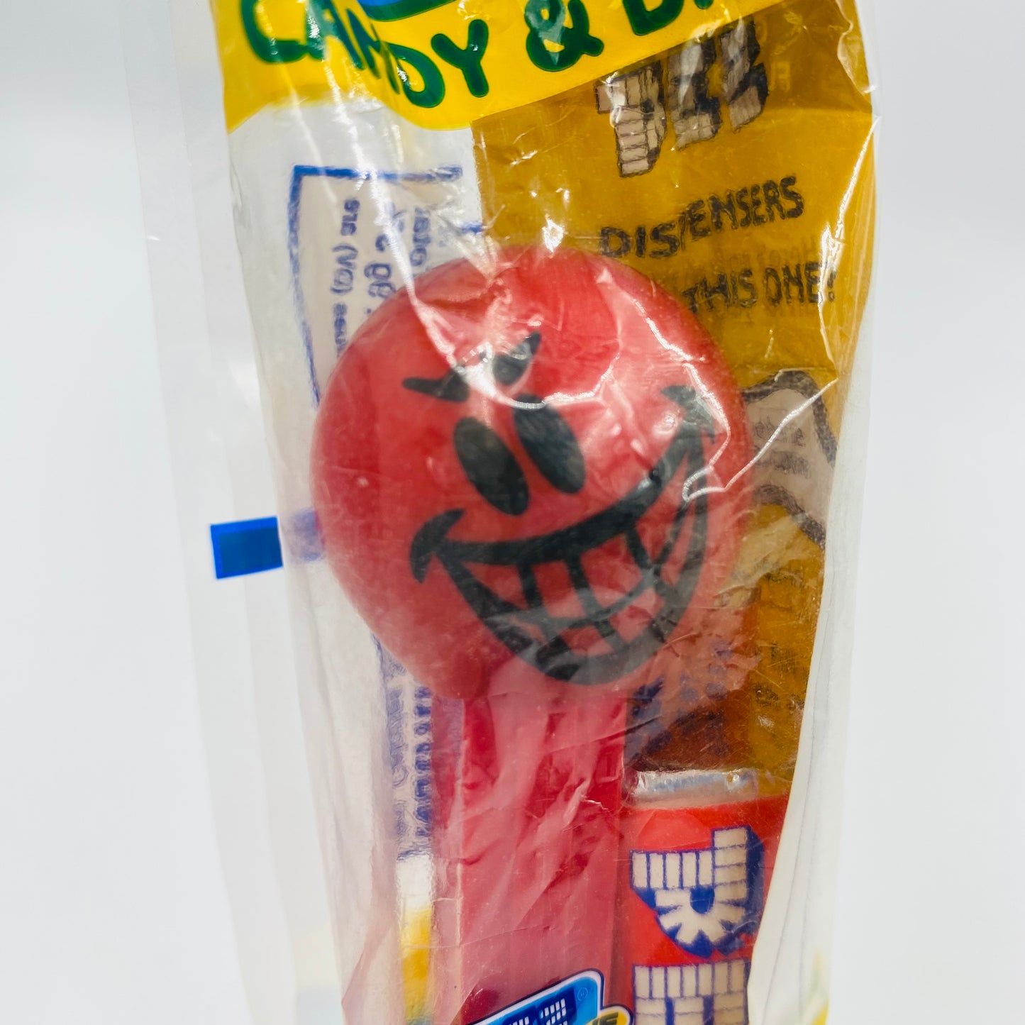 Funky Faces Mischievous Smile Face red stem PEZ dispenser (2003) bagged 4.9 Hungary blue cello