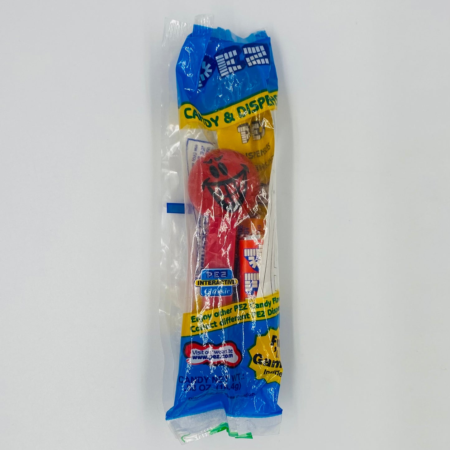 Funky Faces Mischievous Smile Face red stem PEZ dispenser (2003) bagged 4.9 Hungary blue cello