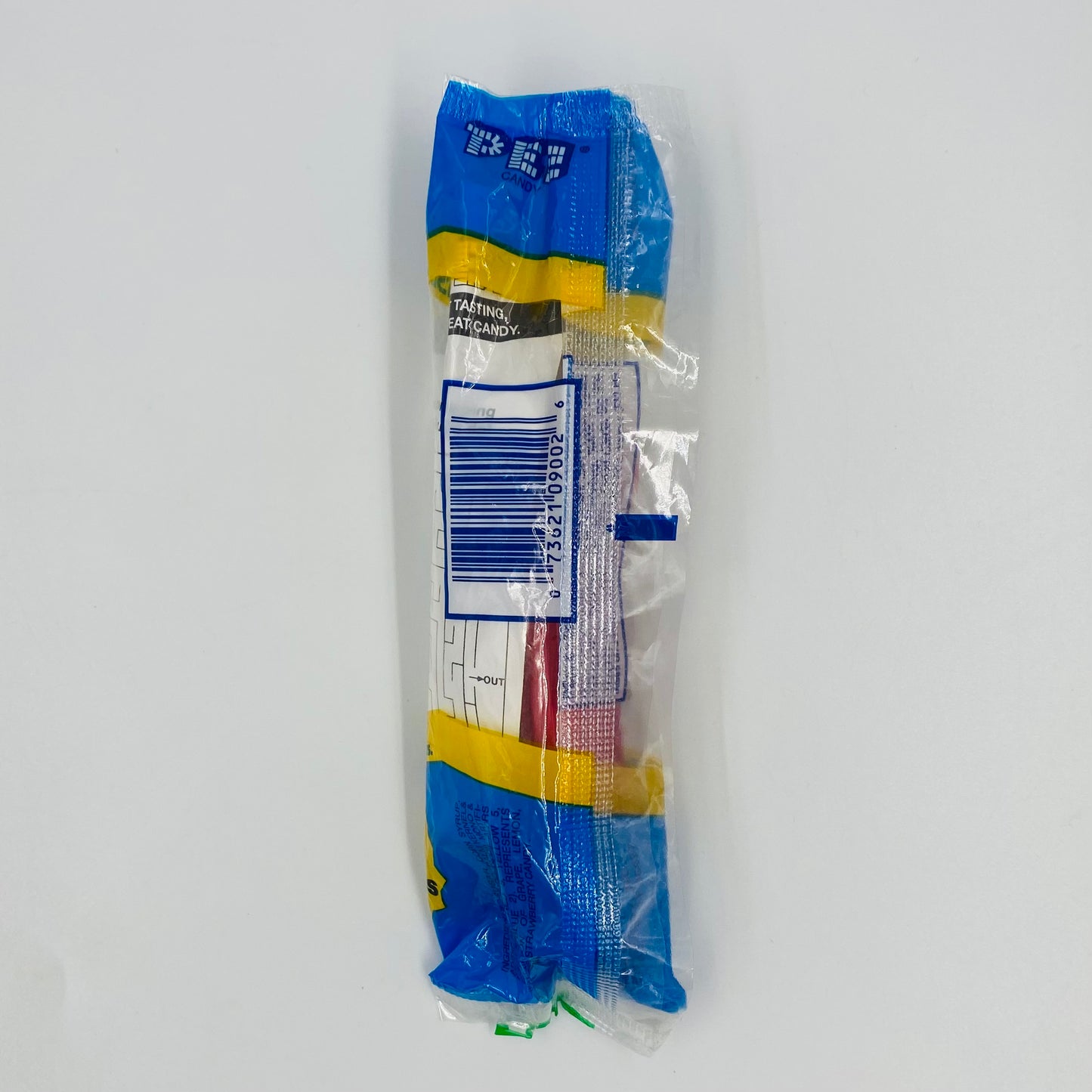 Funky Faces Mischievous Smile Face red stem PEZ dispenser (2003) bagged 4.9 Hungary blue cello