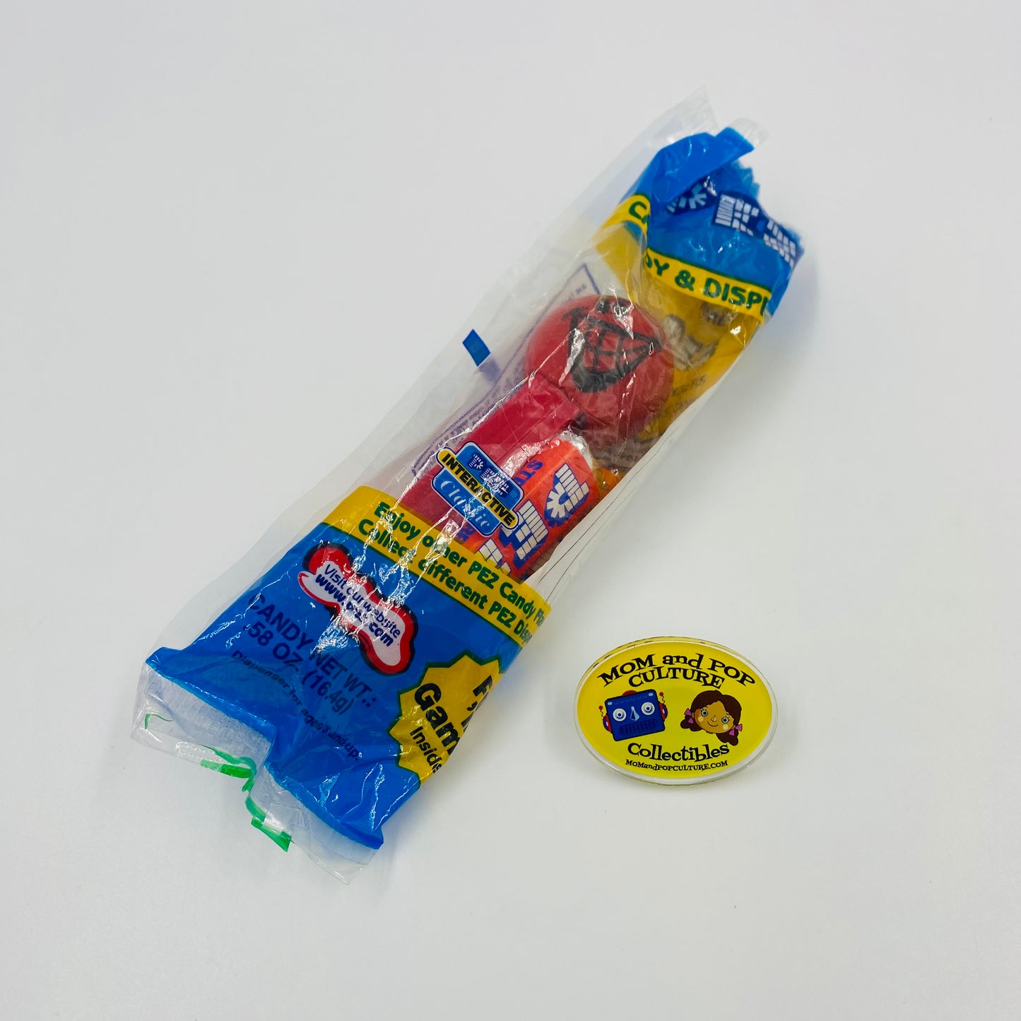 Funky Faces Mischievous Smile Face red stem PEZ dispenser (2003) bagged 4.9 Hungary blue cello
