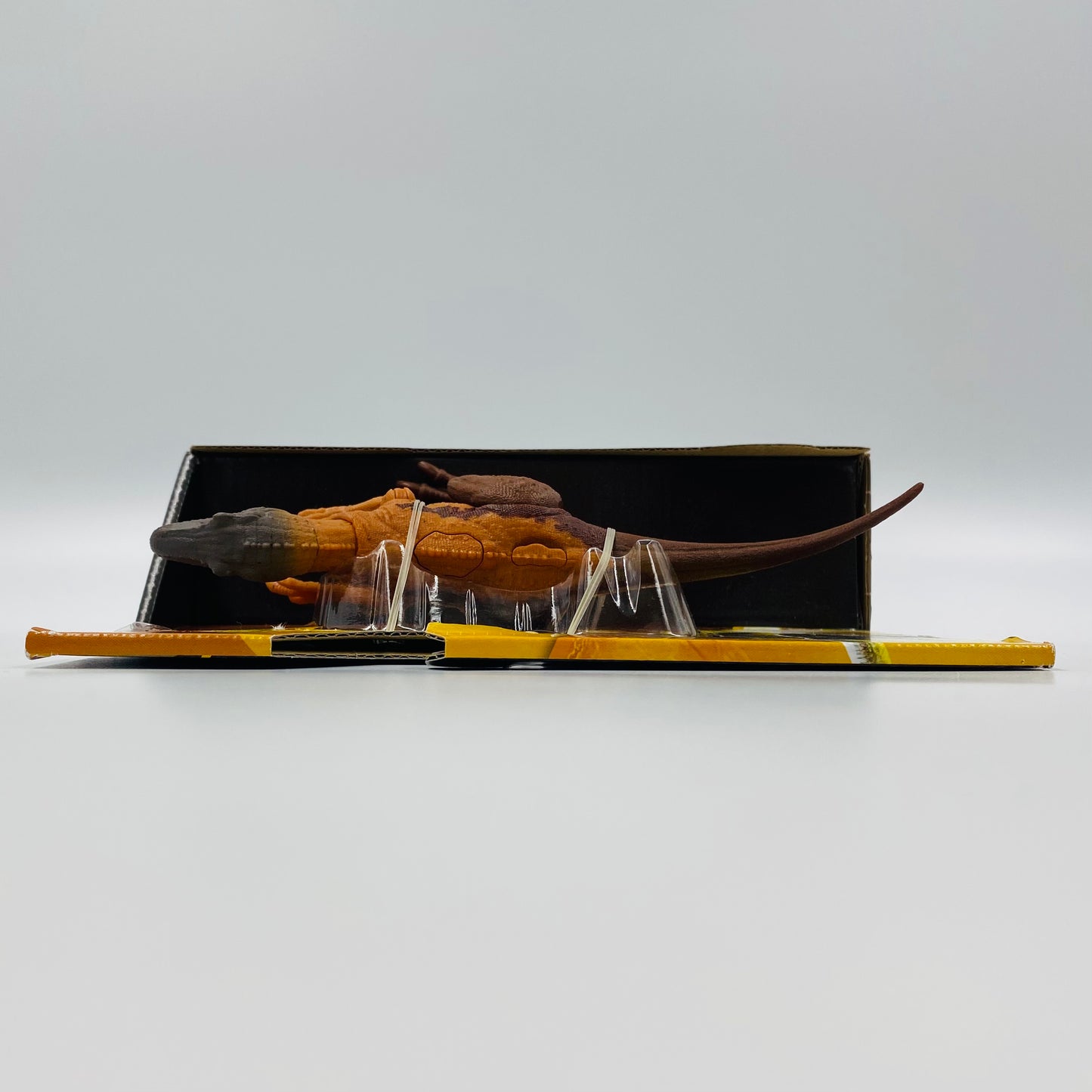 Jurassic World Dino Trackers Strike Attack Herrerasaurus carded action figure (2023) Mattel