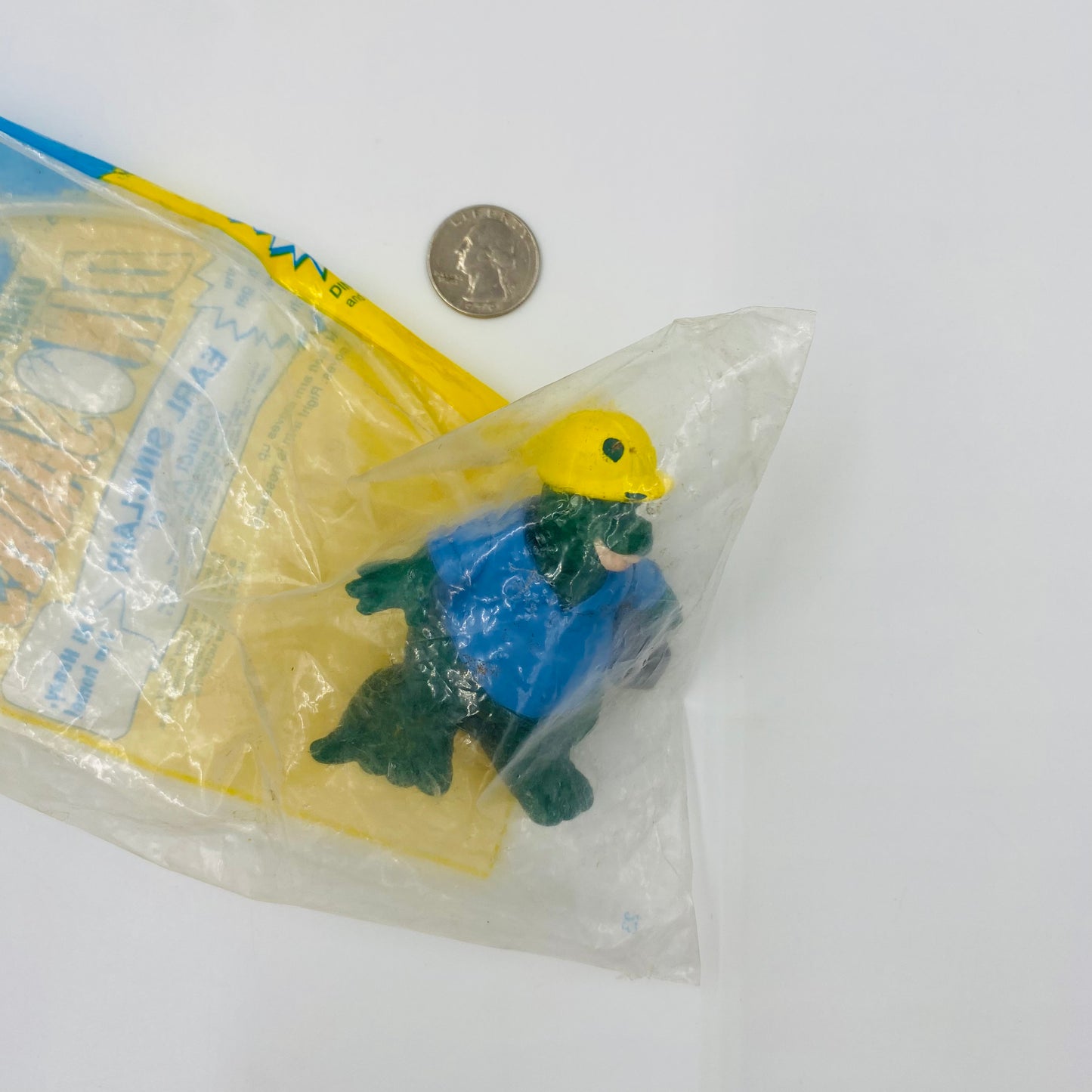 Dinosaurs Dino-Motion Earl Sinclair McDonald's Happy Meal toy (1992) bagged (chipped helmet)