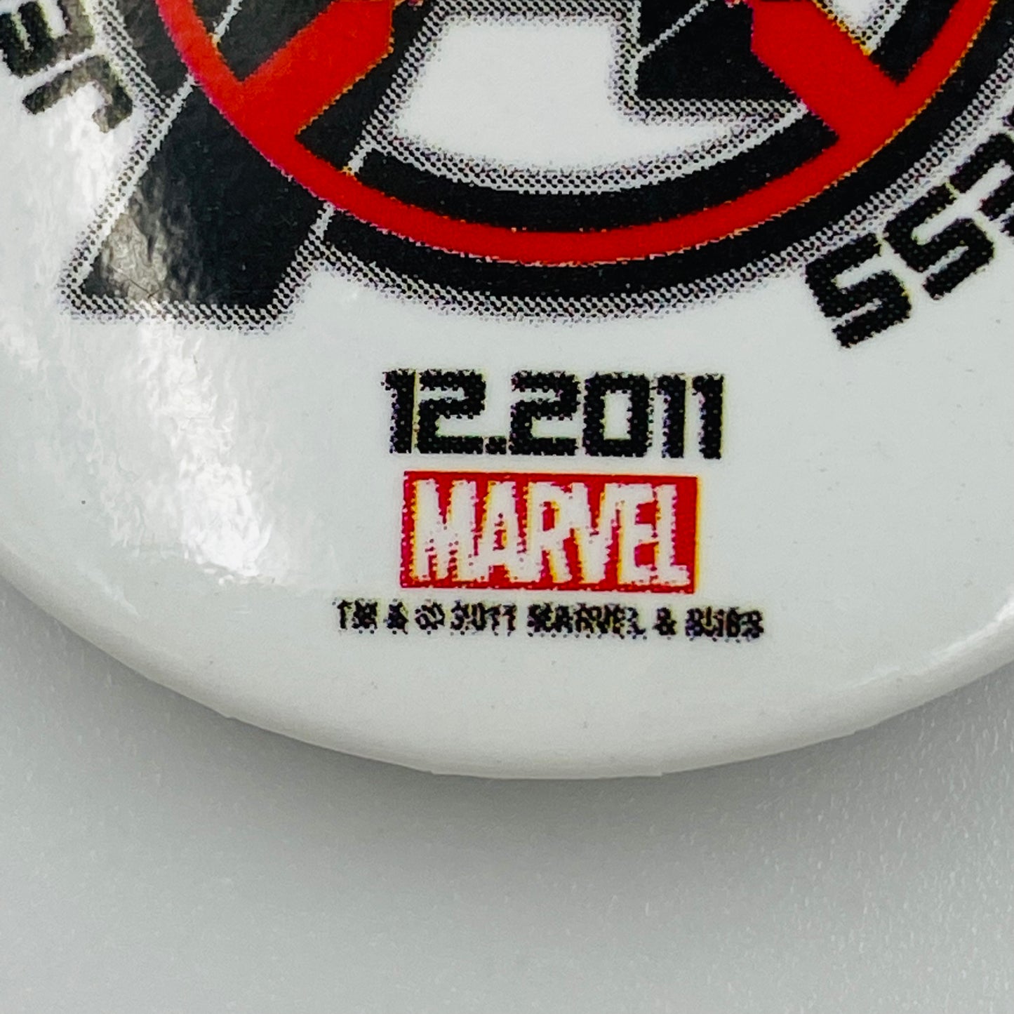 Avengers X-Sanction promo pinback button (2011)